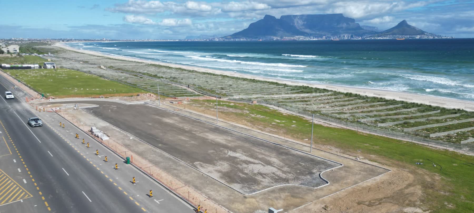 The new Table View parking area under construction, with Table Mountain across the bay