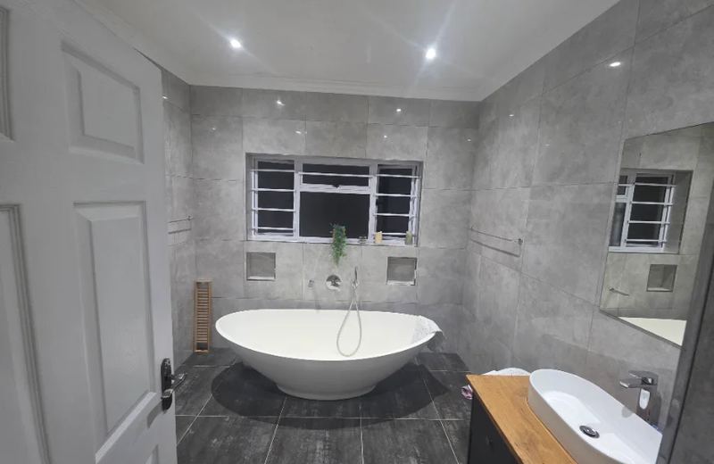 Renovated bathroom with freestanding bath at Richmond Estate, Cape Town