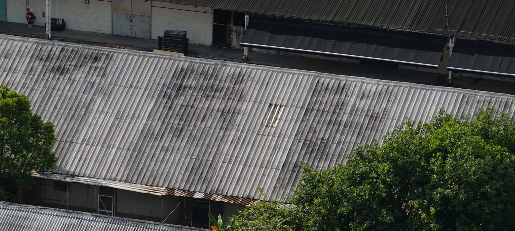 Weathered corrugated roof sheeting on older buildings