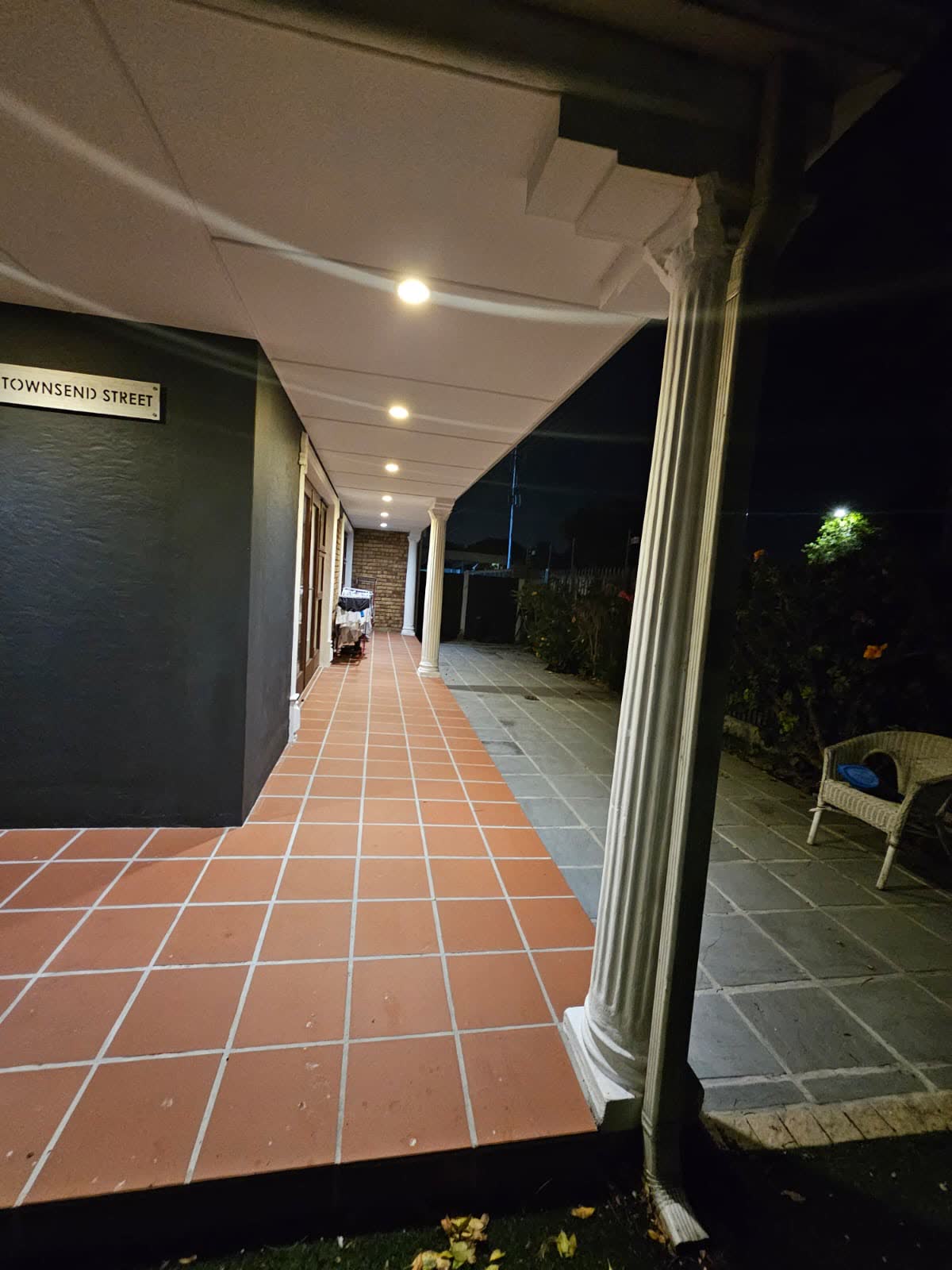 The completed covered verandah at Townsend Estate with new terracotta tiles and columns